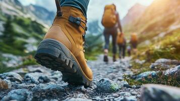 Close-Up of A group of hikers walking on a mountain path focus photo