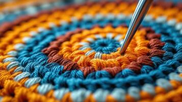 Crochet hook in use, with yarn forming intricate patterns photo