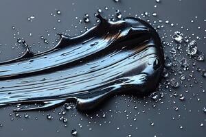 Abstract Expression in Black Paint with Textured Streaks and Metallic Droplets for Modern Art and Design photo