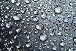 Close-Up Water Droplets on Smooth Metallic Surface for Texture Design photo