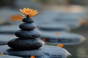 Zen Balance and Harmony Tranquil Lotus Flower on Stacked Stones in Calming Water Scene for Mindfulness and Meditation photo