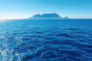 Majestic Ocean View of Table Mountain Under Blue Sky for Travel and Nature Concepts photo
