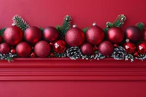 Festive Holiday Decorations with Red Christmas Ornaments and Pine Cones on Mantel photo