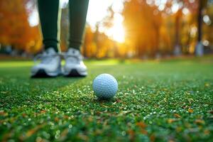 Autumn Golf Scene with Ball on Dewy Grass for Sports Concept and Seasonal Theme photo