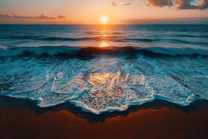 A beautiful sunset over the ocean with waves photo