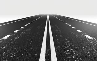 An empty road with white lines on it photo