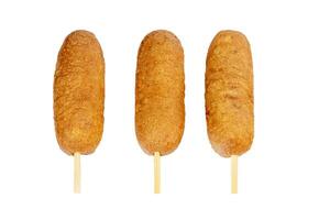 Corn dogs with different fillings and different sauces. isolated on background. photo