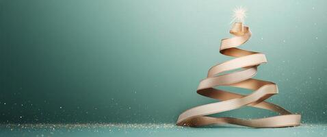 Decorative golden ribbon shaped like a Christmas tree on a softly illuminated green background photo