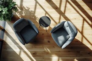 Cozy seating area with modern chairs and coffee table in a sunlit room photo