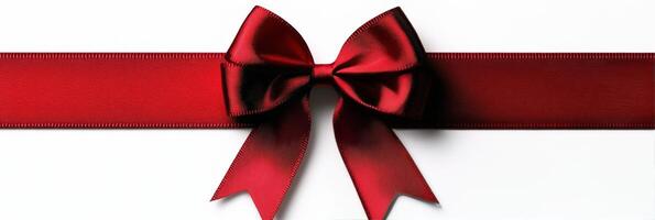 Elegant red bow adorns a velvet ribbon for gift wrapping and festive occasions photo