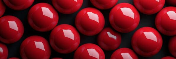 Close up view of shiny red balls arranged neatly on a flat surface during daylight photo