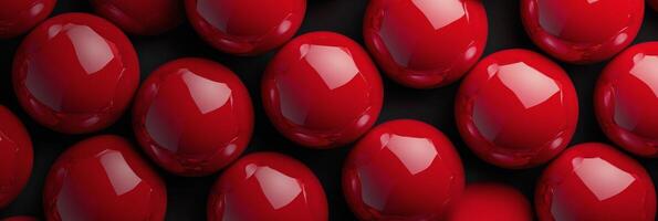 Close up view of shiny red balls arranged neatly on a flat surface during daylight photo
