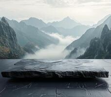 Mysterious platform amid majestic mountains and foggy landscape at dawn photo