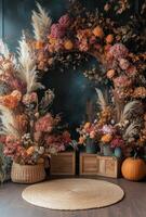 Autumn floral arch with dried flowers and decorative elements in warm tones photo