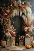 Autumn floral arch with dried flowers and decorative elements in warm tones photo