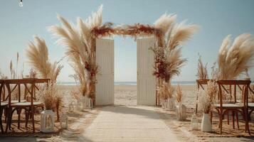 Beautiful beach wedding setup at sunset with elegant floral arrangements and soft lighting photo