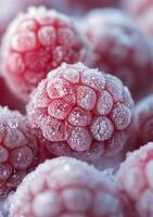 Frozen raspberries glistening with frost on a soft, blurred pastel background during winter photo