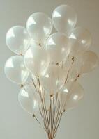 Elegant white balloons gathered together for a celebration or event indoors photo