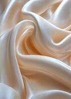 Soft, flowing cream colored silk fabric with delicate folds and subtle sheen captured in detail photo