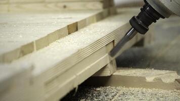 A Professional Tool Cutting Wood Close-Up View of Precision Crafting Process in Action. Stock Clip photo
