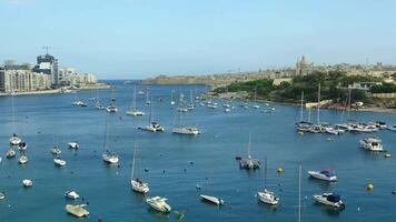 Time lapse of the harbour of Valetta on Malta with many yachts and boats in the sunshine. video