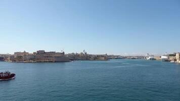 View of the historic harbour of Valetta in Malta with some cruise ships in the background. video