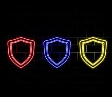 Neon shield icon. Glowing neon shield sign, outline guard symbol in vivid colors. Online security and protection, safety and guarantee emblem, antivirus firewall. Icon set, sign for UI vector