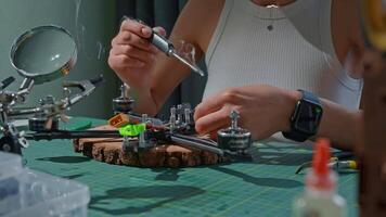 Building a drone with precision tools in a home workshop video