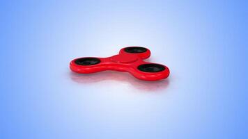 3D Fidget Spinner Rotating on a Blue Reflective Floor. Fidget Spinner 3D. 4K video