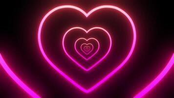 Glowing Heart Animation on a Black Background. Seamless Loop. Heart Background. 4K video