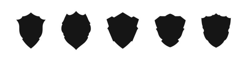 Shield silhouette icons. Silhouette icons of shields in different shapes vector