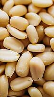 Rotating background of lots of pine nuts, Close up, Slow motion video