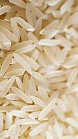 Rotating background of lots of Basmati rice Close up, Slow motion video