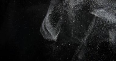 Organic system of dust particles on black screen overlay. Filmed with RED camera in slow motion. Abstract shapes background. video