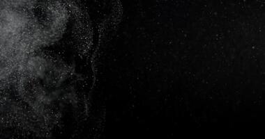 Dust Particles System in motion in black screen. Filmed with RED camera. video