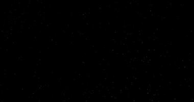 Cinematic dust particles floating on black background in slow motion overlay. Atmosphere filmed with RED camera video