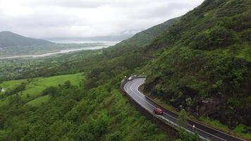 Aerial view of highway going through mountain pass video