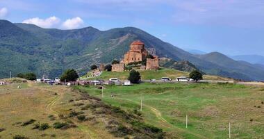 Drone flight over Jvari Monastery near Mtskheta, Georgia, on a sunny day, with beautiful views video