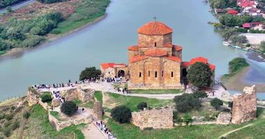 Drone flight over Jvari Monastery near Mtskheta, Georgia, on a sunny day, with beautiful views video