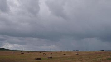 Time lapse field without wheat with clouds video