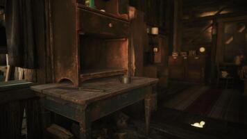 Rustic wooden table in a cozy, dimly lit cabin with a simple metal bowl video