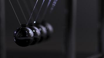 Newton's cradle physics concept for action and reaction or cause and effect. Balls Newton photo