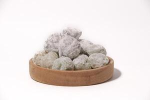 Mochi - trendy and sweet dessert, Mochi cake on a plate on a white background. photo
