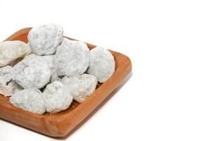 Mochi - trendy and sweet dessert, Mochi cake on a plate on a white background. photo