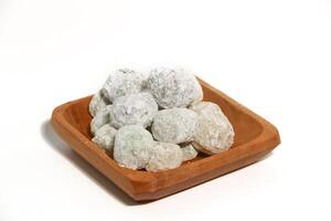 Mochi - trendy and sweet dessert, Mochi cake on a plate on a white background. photo