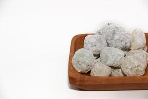 Mochi - trendy and sweet dessert, Mochi cake on a plate on a white background. photo