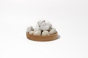 Mochi - trendy and sweet dessert, Mochi cake on a plate on a white background. photo