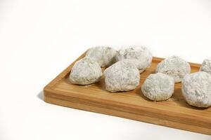 Mochi - trendy and sweet dessert, Mochi cake on a plate on a white background. photo
