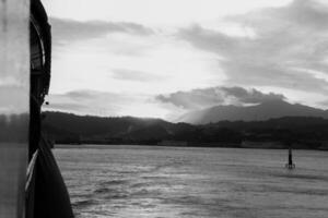 Landscape view between the sky and the vast sea, located at Sunda Strait, Lampung, Indonesia photo