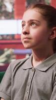Teenage girl discussing her mental health in counseling session, dealing with hormonal shifts and internal frustration. Psychotherapist helps her tackle depression and self esteem issues. Camera A. video